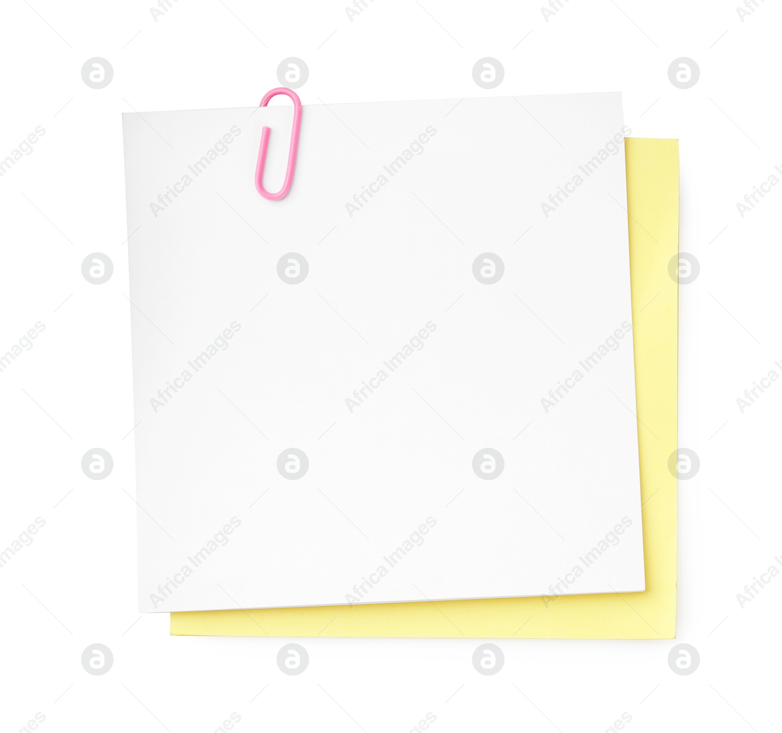 Photo of Blank paper notes attached with clip isolated on white, top view