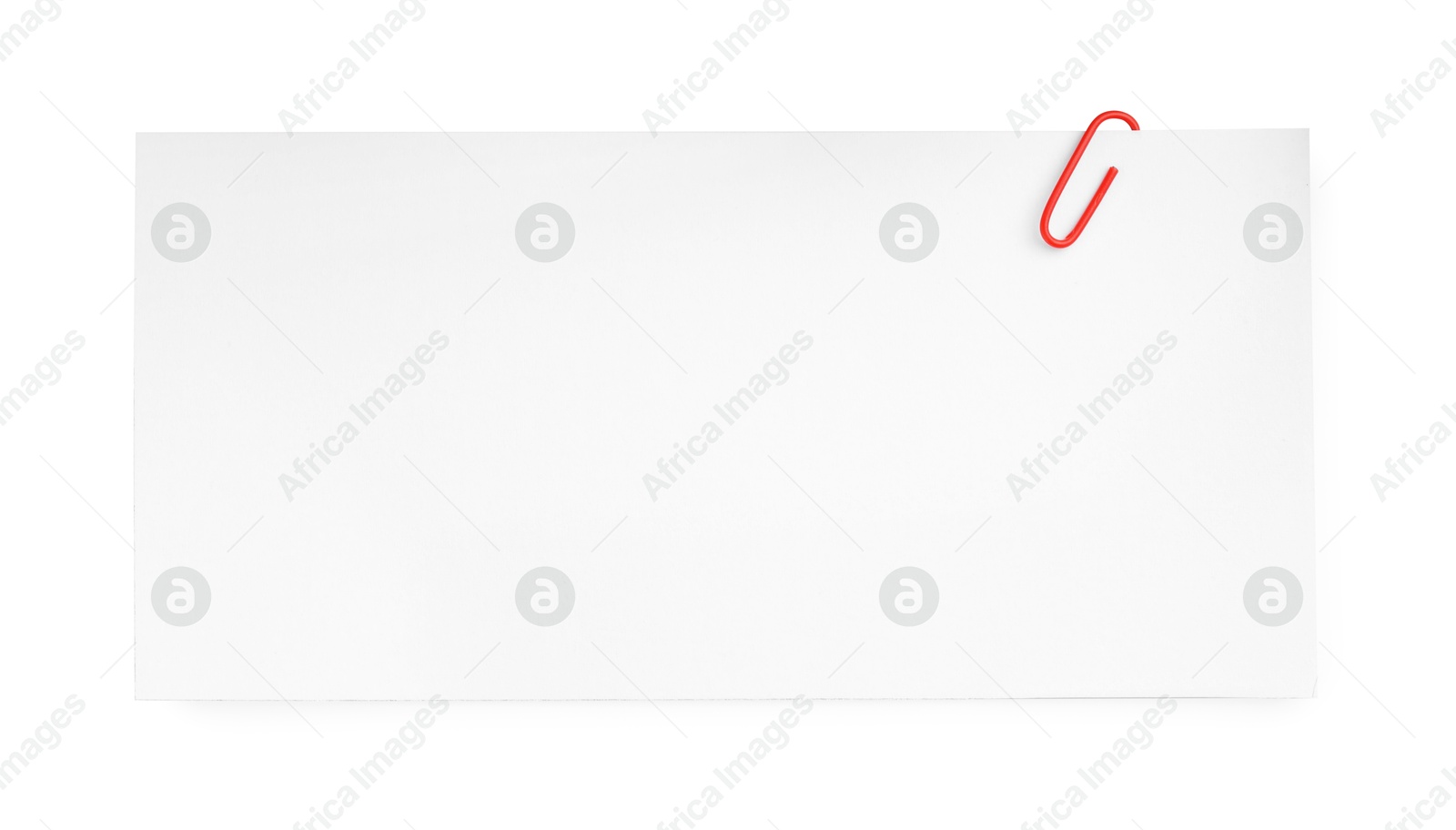 Photo of Blank paper sheet attached with clip isolated on white, top view