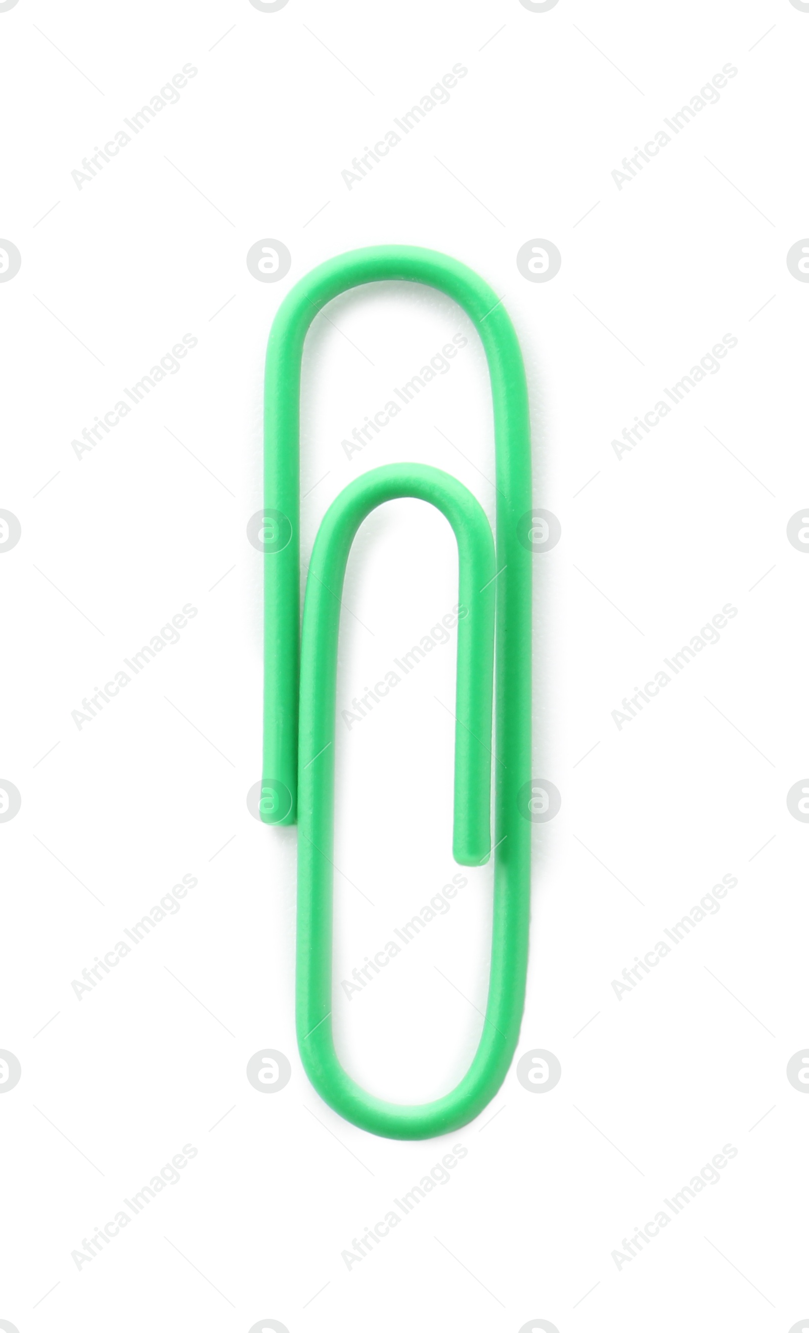 Photo of One bright paper clip isolated on white, top view