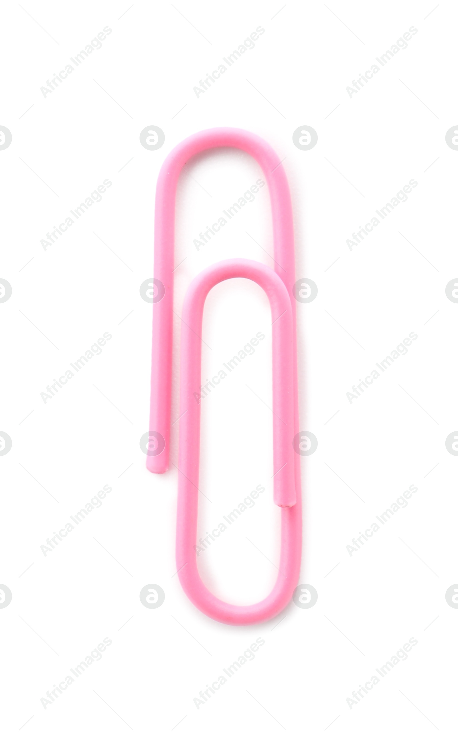 Photo of One bright paper clip isolated on white, top view