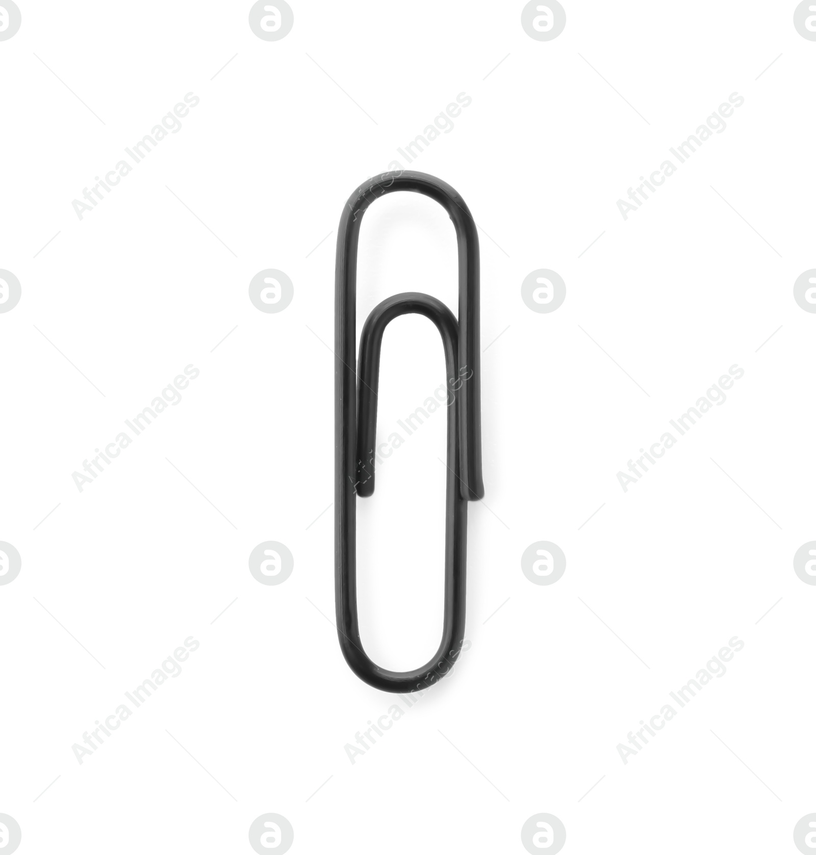 Photo of One black paper clip isolated on white, top view