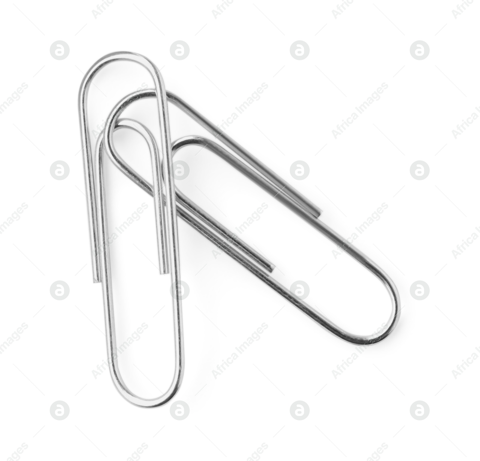 Photo of Metal paper clips isolated on white, top view