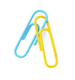 Photo of Paper clips isolated on white. Office stationery