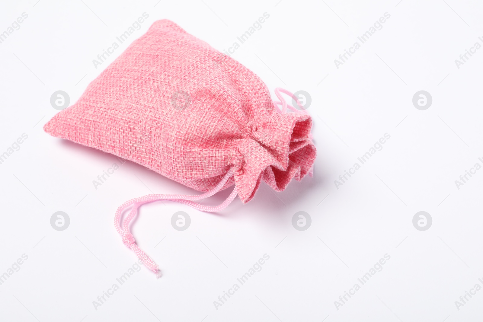 Photo of One pink burlap sack on white background