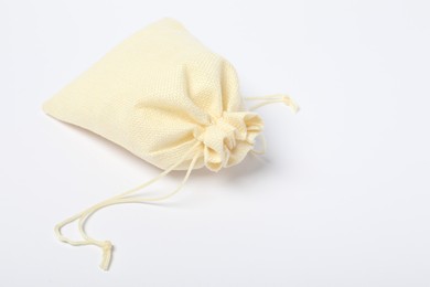 Photo of One beige burlap sack on white background