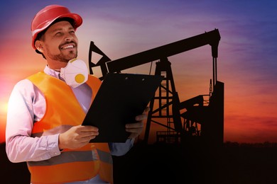 Image of Worker at oil production site with crude oil pump