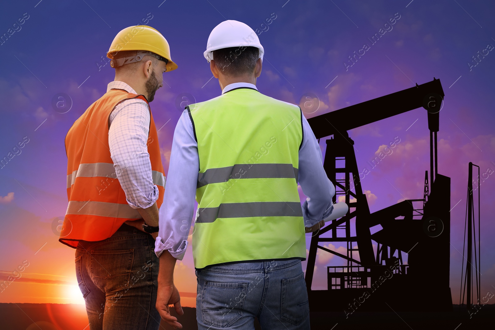 Image of Workers at oil production site with crude oil pump