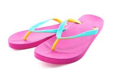 Photo of Pair of stylish pink flip flops isolated on white. Beach object