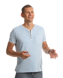 Man in casual clothes talking on white background