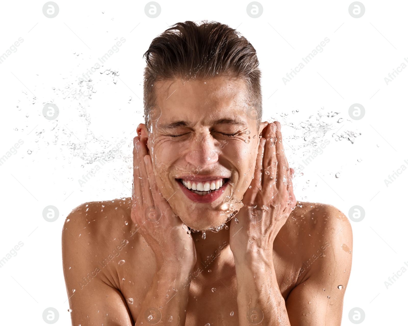 Photo of Smiling man washing his face on white background