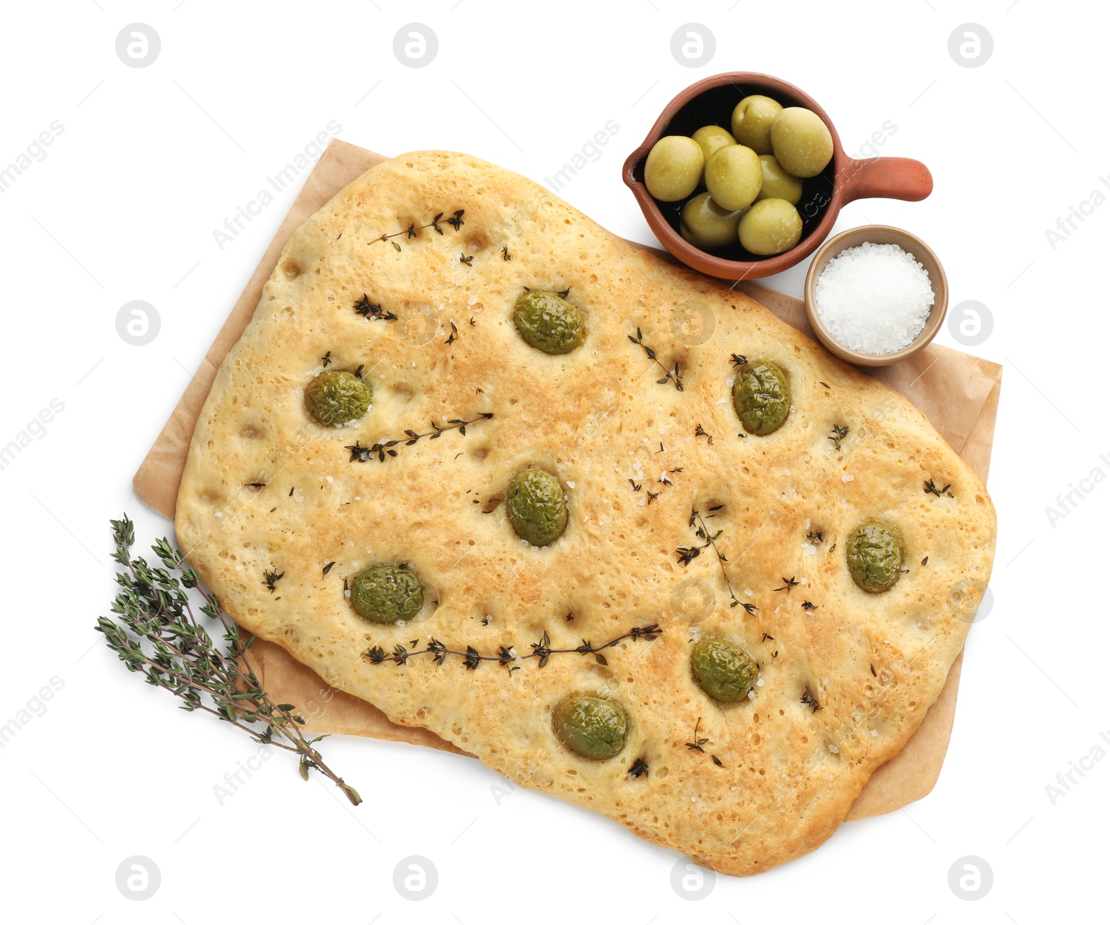 Photo of Delicious focaccia bread with olives, salt and thyme isolated on white, top view