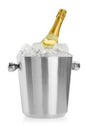 Photo of Bottle of champagne in ice bucket isolated on white