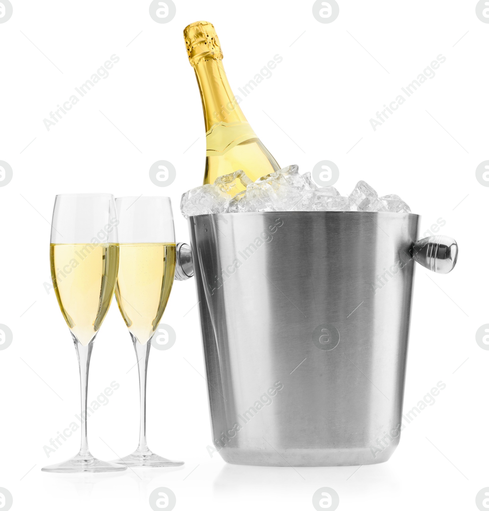 Photo of Champagne in glasses and ice bucket with bottle isolated on white