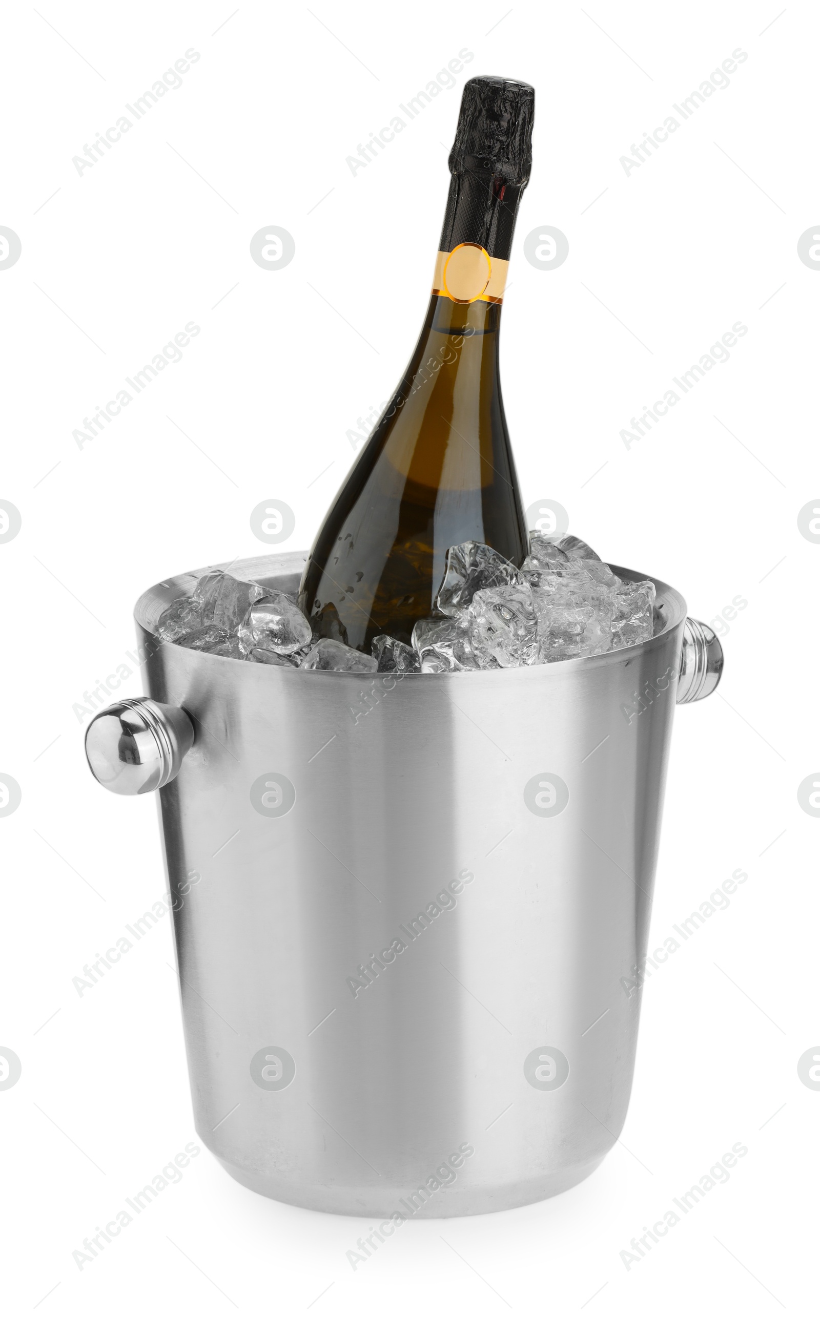 Photo of Bottle of champagne in ice bucket isolated on white