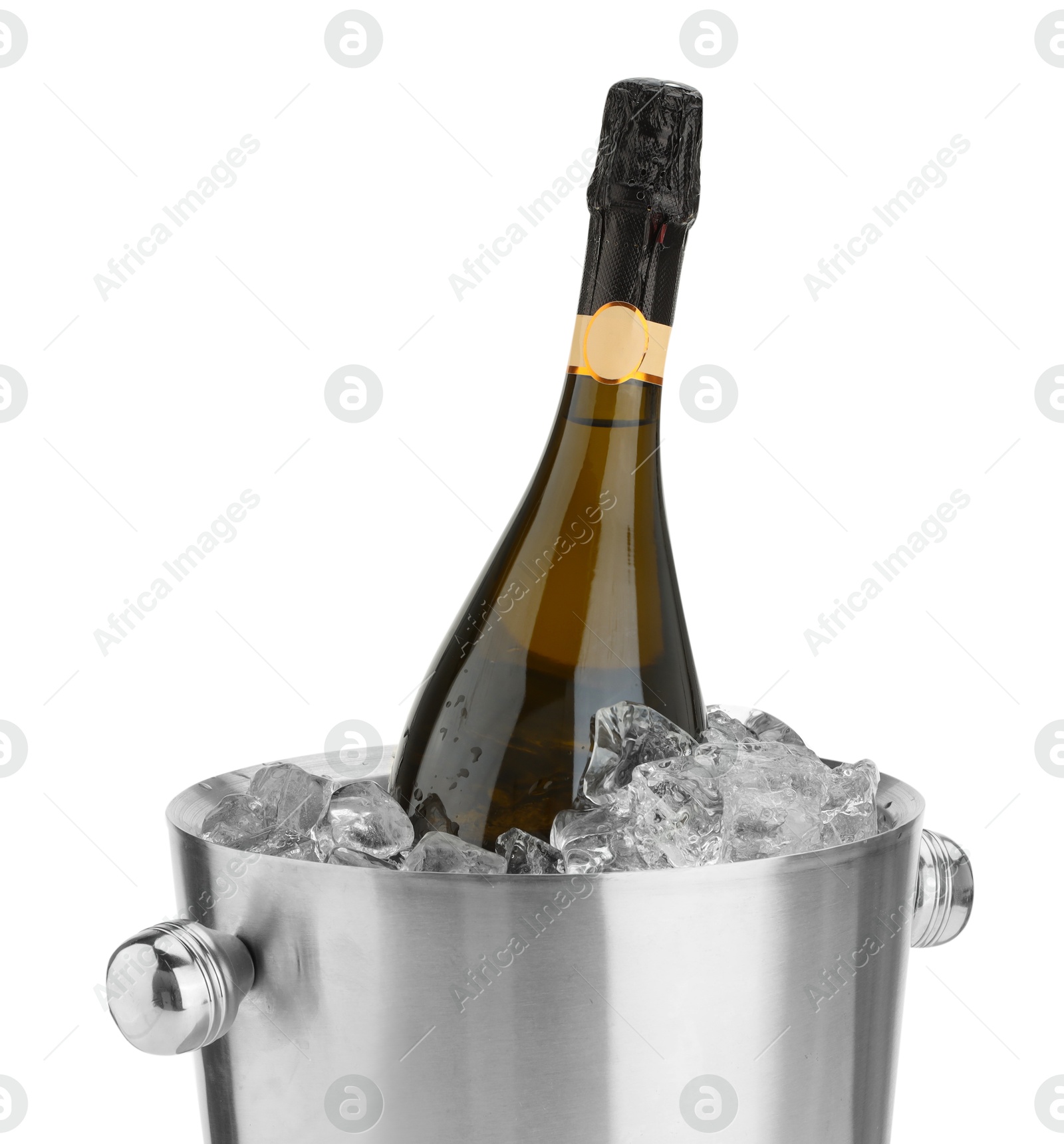 Photo of Bottle of champagne in ice bucket isolated on white