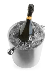 Photo of Bottle of champagne in ice bucket isolated on white