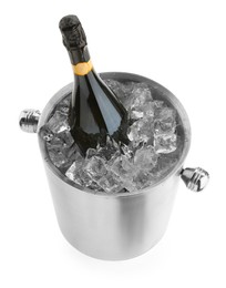 Photo of Bottle of champagne in ice bucket isolated on white