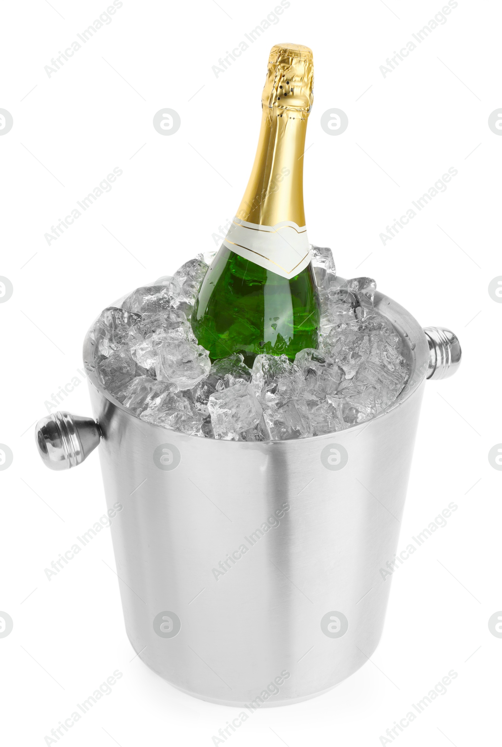 Photo of Bottle of champagne in ice bucket isolated on white