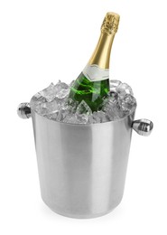 Photo of Bottle of champagne in ice bucket isolated on white