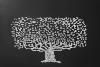 Photo of Beautiful drawing of tree on black chalkboard