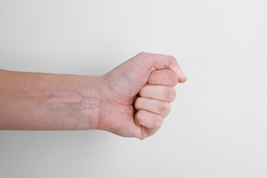 Photo of Woman with visible hand veins on white background, closeup. Space for text