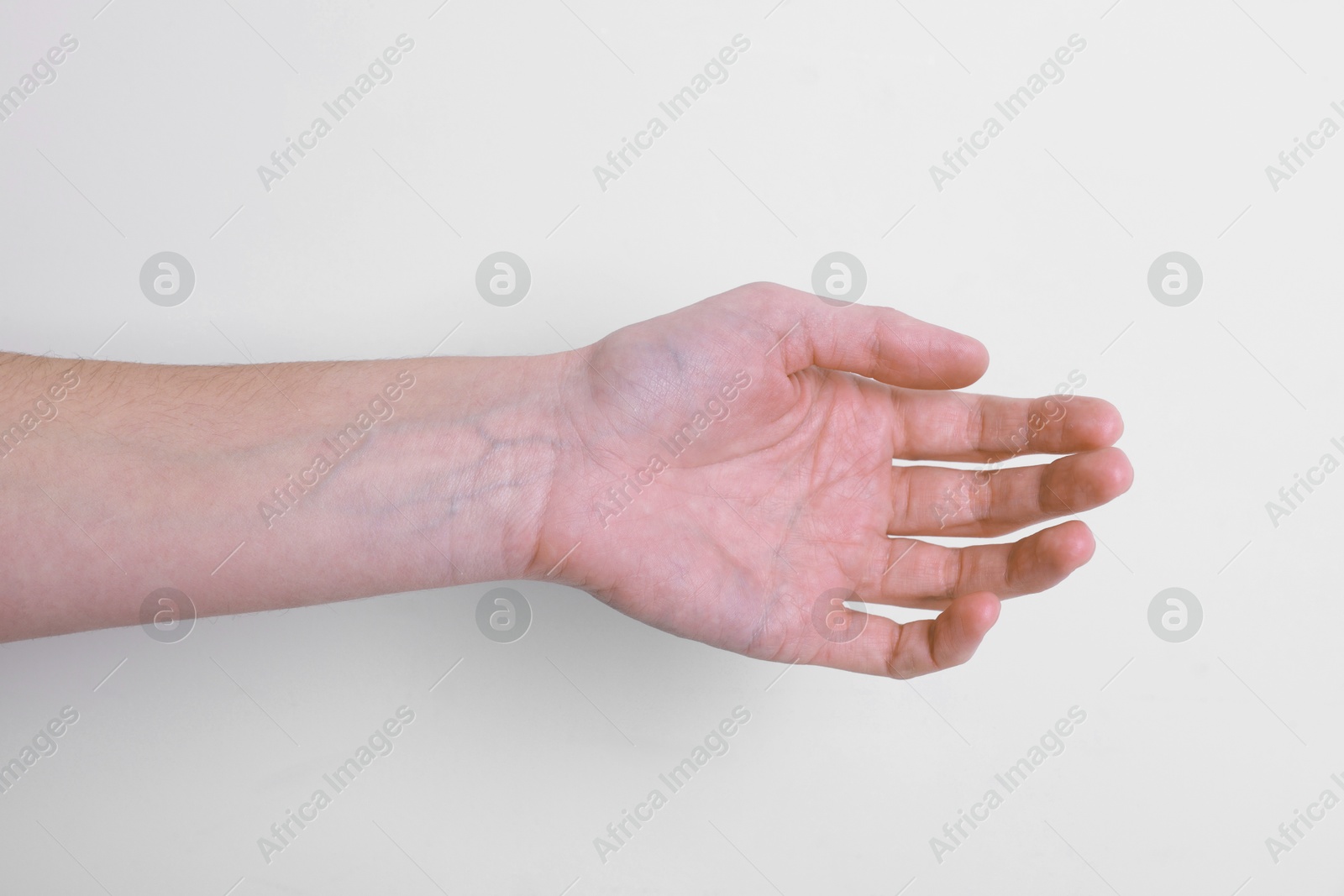 Photo of Woman with visible hand veins on white background, closeup