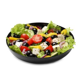 Photo of Delicious fresh Greek salad isolated on white