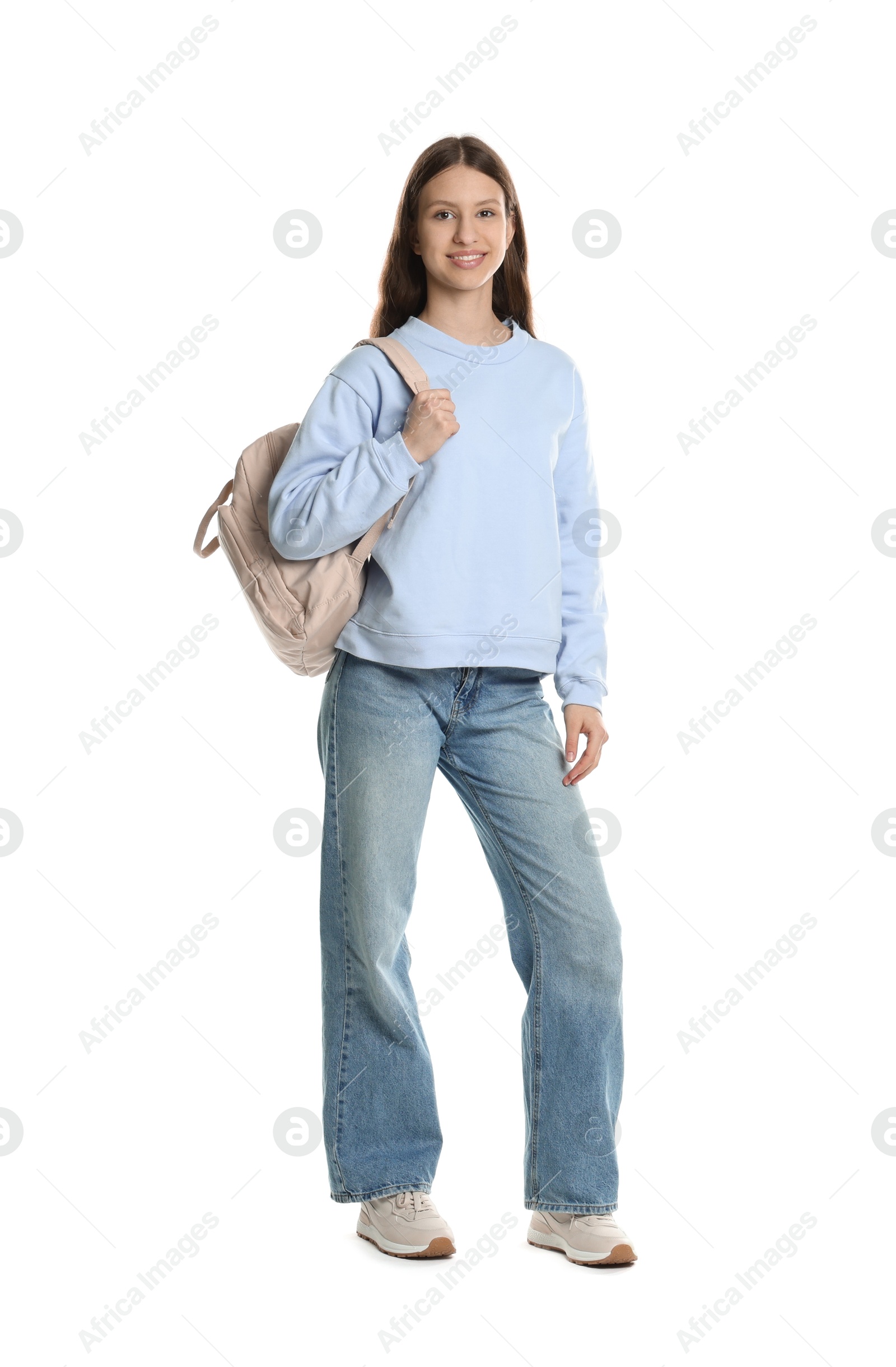 Photo of Smiling teenage girl with backpack on white background