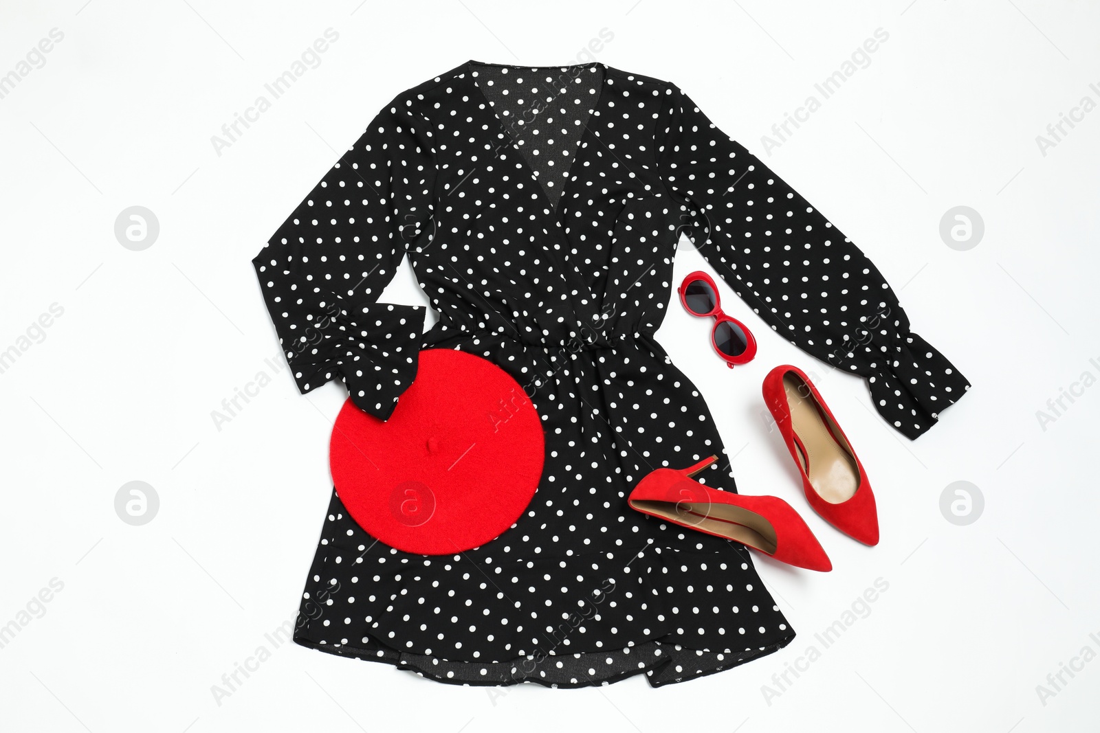 Photo of Retro styled outfit on white background, flat lay