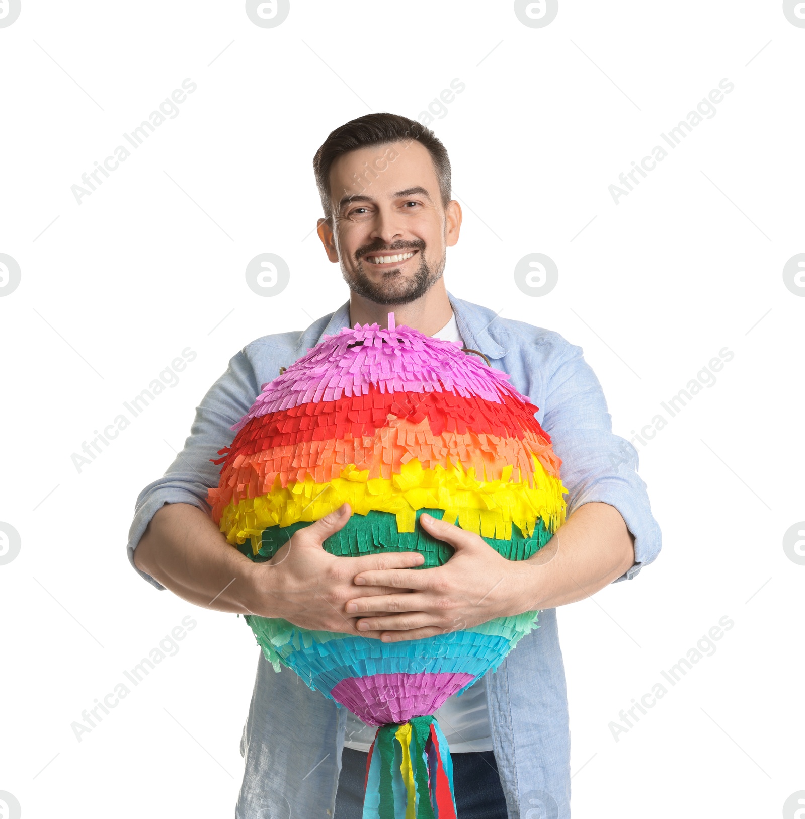 Photo of Happy man with colorful pinata on white background