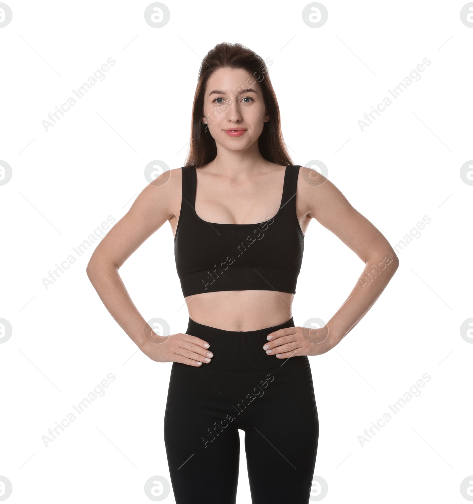 Photo of Portrait of woman in sportswear on white background