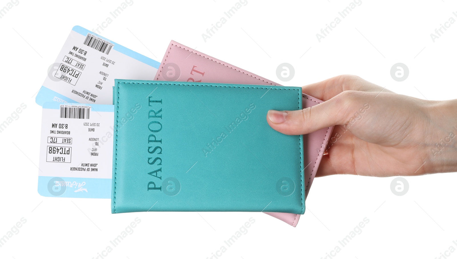 Photo of Travel agency. Woman holding flight tickets and passports on white background, closeup