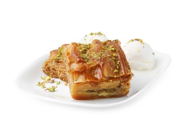 Photo of Delicious baklava with crushed nuts and ice cream isolated on white