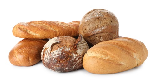 Different freshly baked bread loafs isolated on white