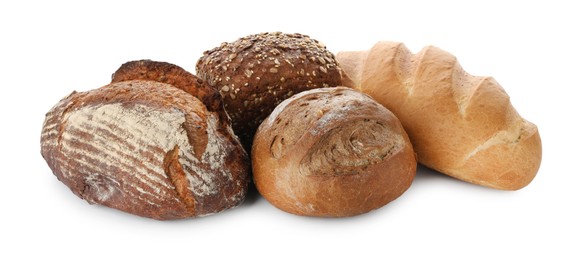 Photo of Different freshly baked bread loafs isolated on white