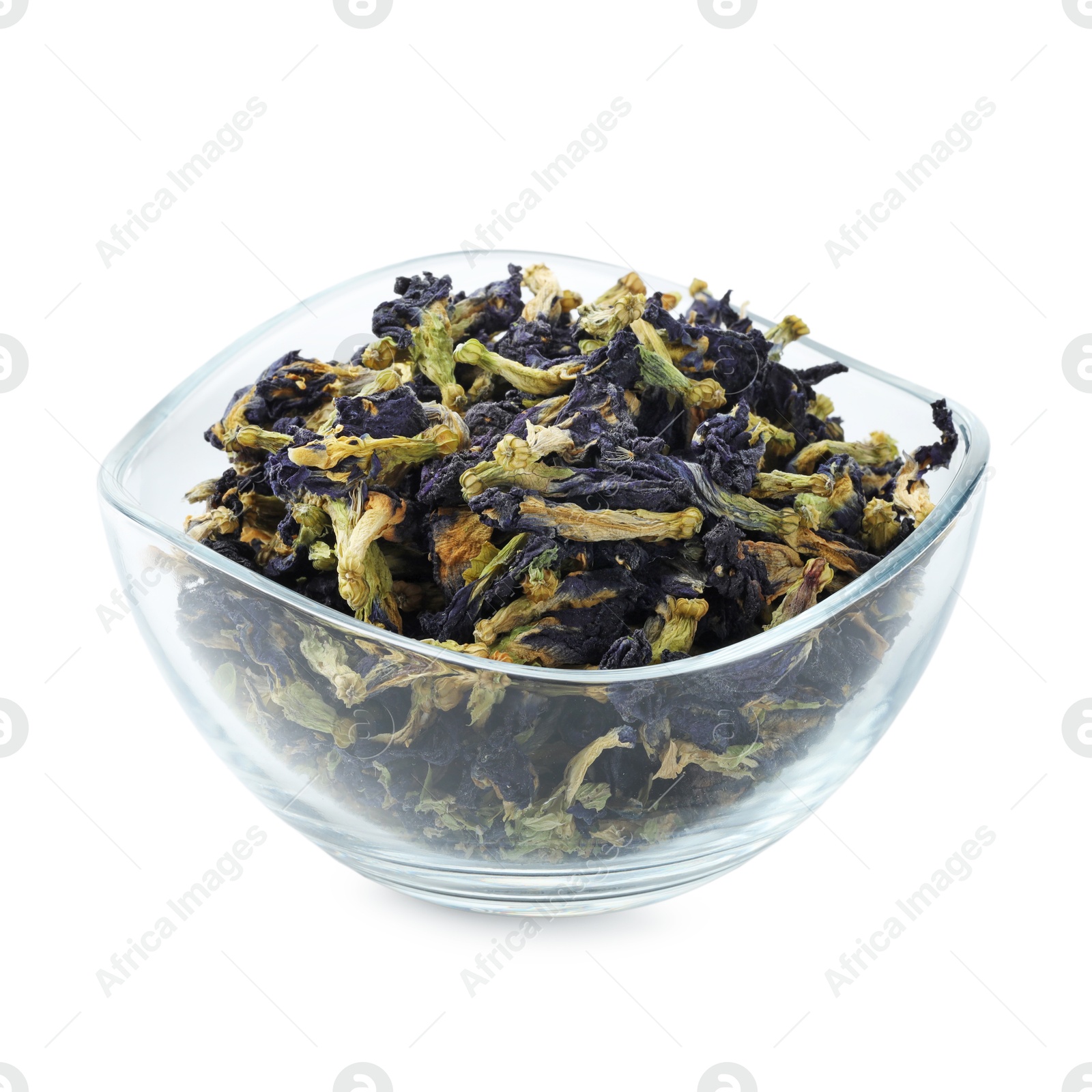 Photo of Butterfly pea flower tea. Dry Clitoria ternatea petals in bowl isolated on white