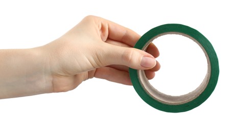 Woman with roll of green adhesive tape on white background, closeup