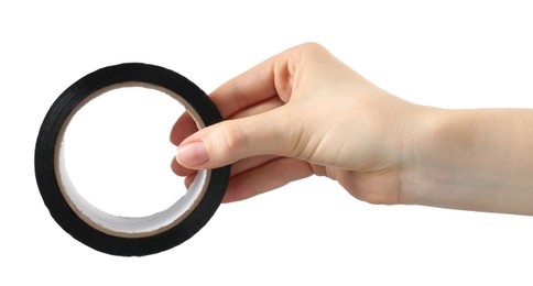 Woman with roll of black adhesive tape on white background, closeup