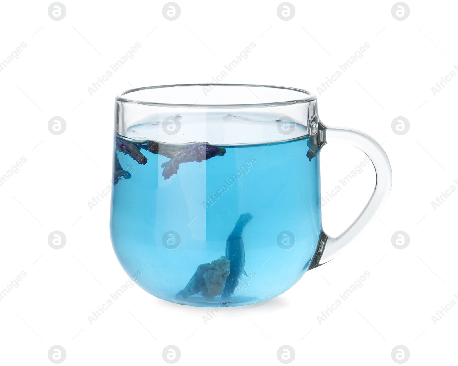 Photo of Delicious butterfly pea flower tea in glass cup isolated on white