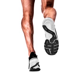 Man running on white background, closeup view