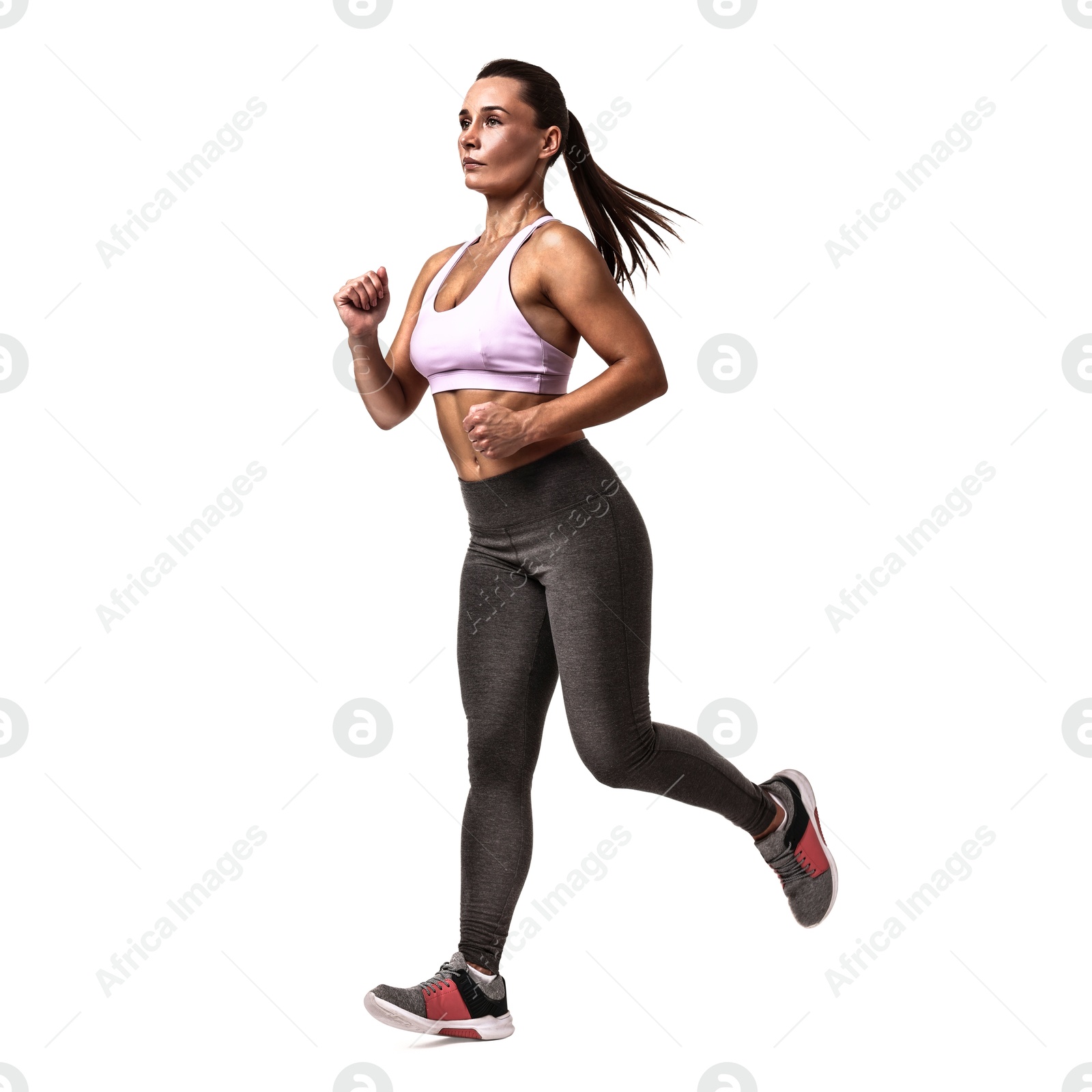 Image of Woman in sportswear running on white background