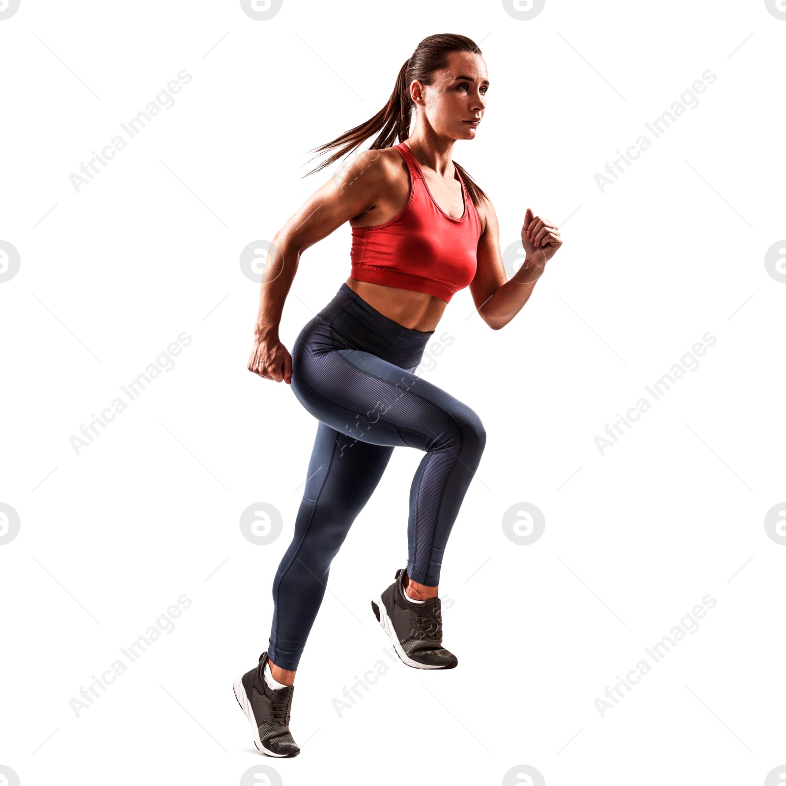 Image of Woman in sportswear running on white background