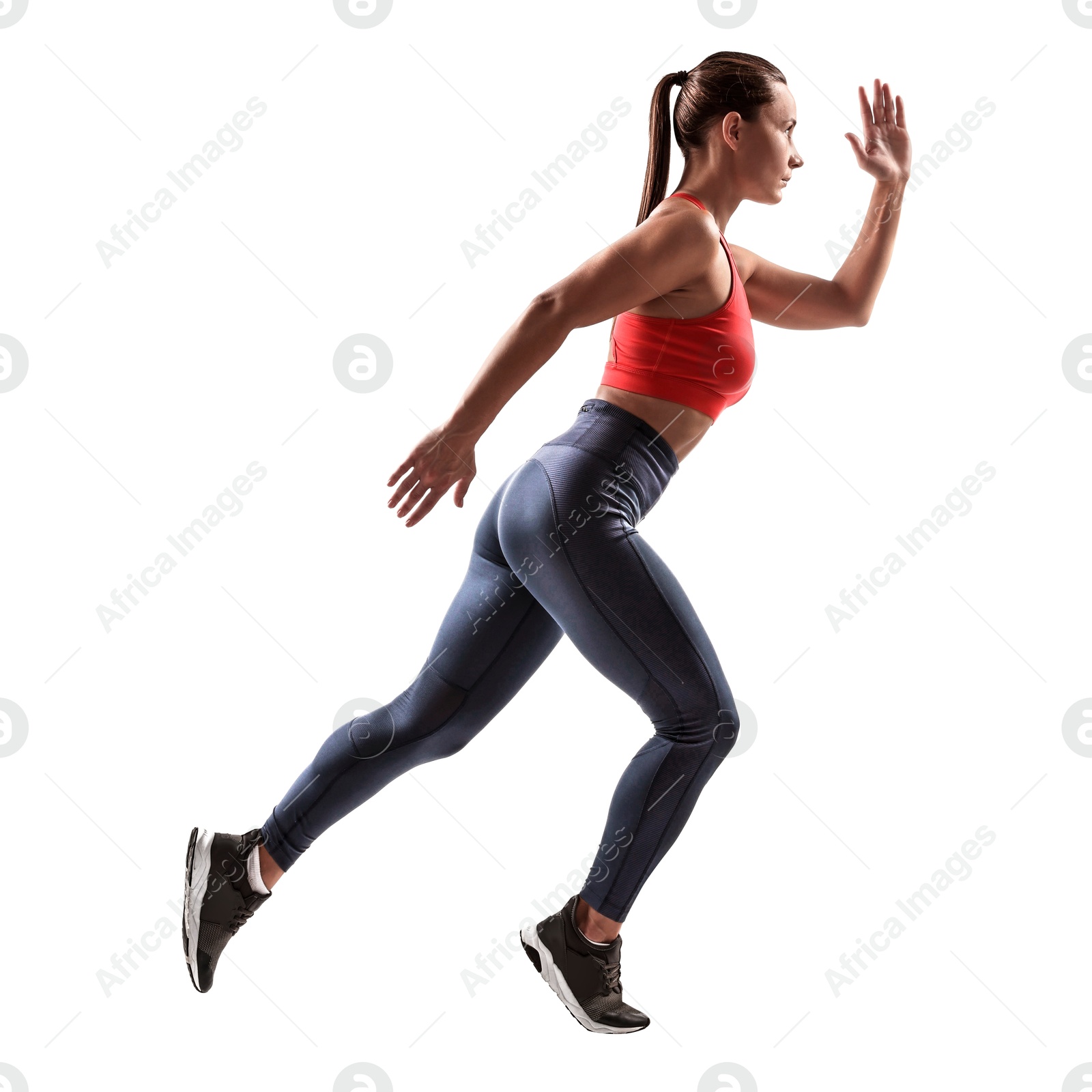 Image of Woman in sportswear running on white background