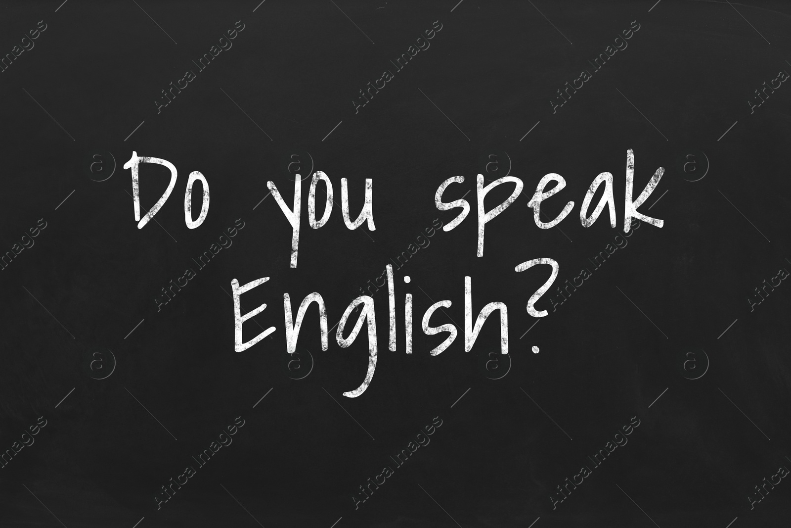 Image of Do You Speak English? text on black chalkboard. Language course