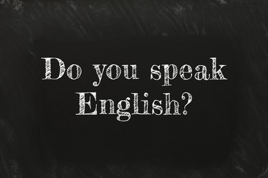 Do You Speak English? text on black chalkboard. Language course