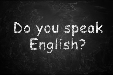 Do You Speak English? text on black chalkboard. Language course