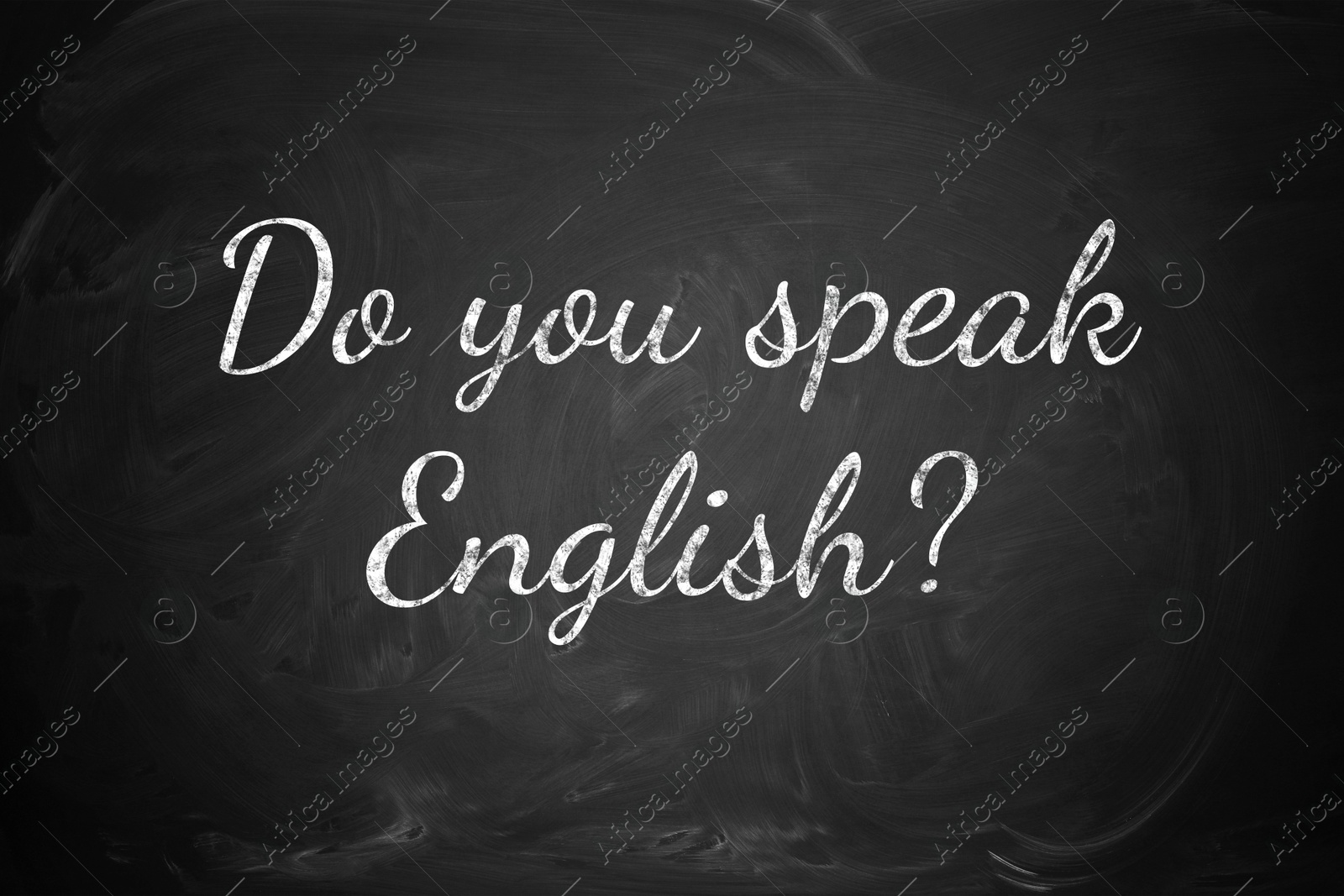 Image of Do You Speak English? text on black chalkboard. Language course