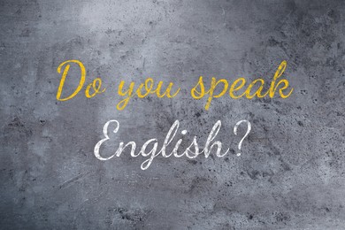 Image of Do You Speak English? text on grey textured background. Language course