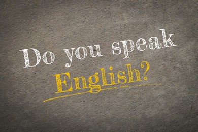 Image of Do You Speak English? text on old paper. Language course