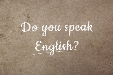 Image of Do You Speak English? text on old paper. Language course